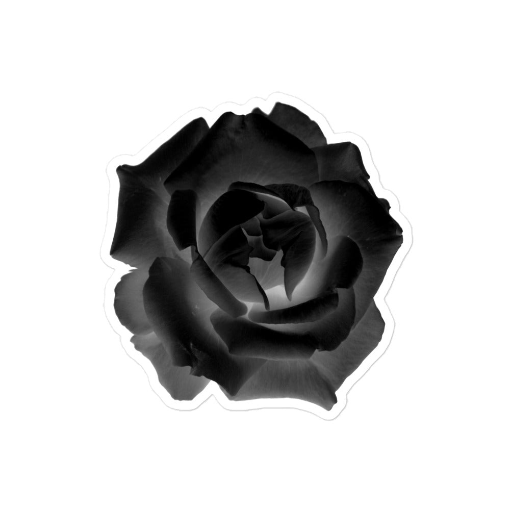 A medium kiss-cut vinyl sticker with an image of a black x-ray rose design.
