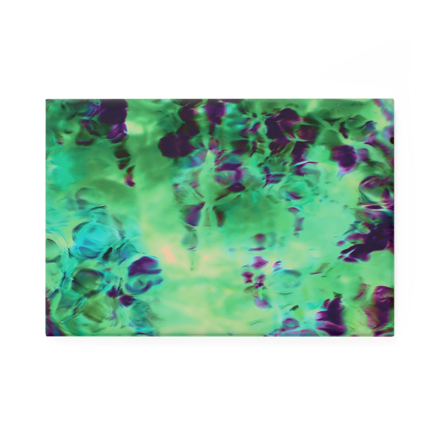 A rectangular button magnet with an image of a vivid green and purple water reflection design.