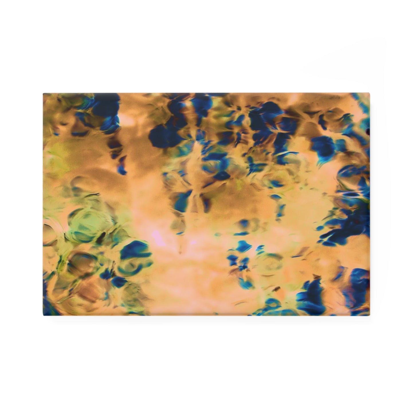 A rectangular button magnet with an image of a vivid orange and blue water reflection design.