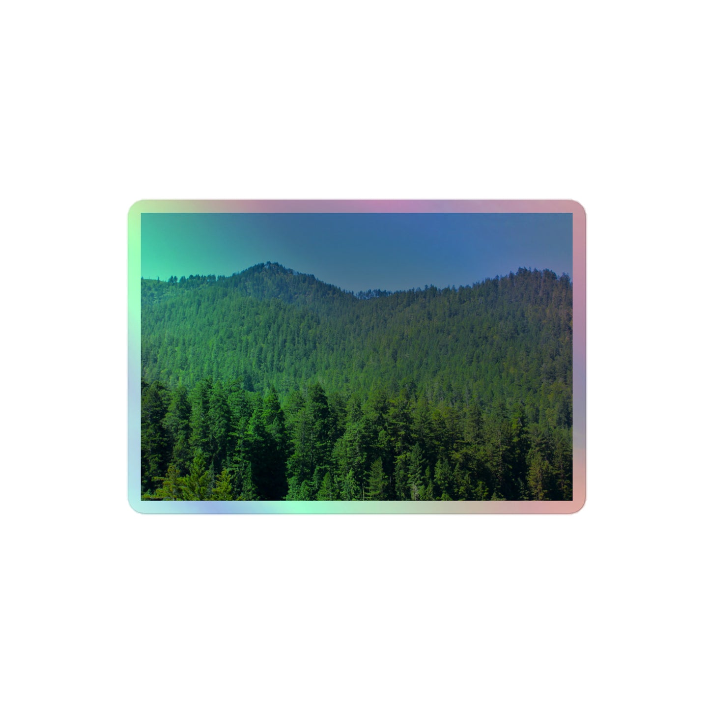 A medium rectangular holographic sticker with a landscape image of blue sky, mountains, and green redwood trees.
