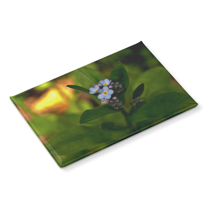 Charming_Blue_Forget-Me-Not_Cluster_Rec_RectangleButtonMagnet_H_Angle_Mockup.png