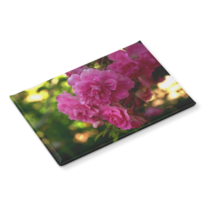 Cheerful_Pink_Roses_Blooming_in_the_Gard_RectangleButtonMagnet_H_Angle_Mockup.png