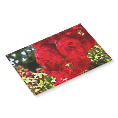 Close-Up_of_Sunlit_Crimson_Roses_Rectan_RectangleButtonMagnet_H_Angle_Mockup.png