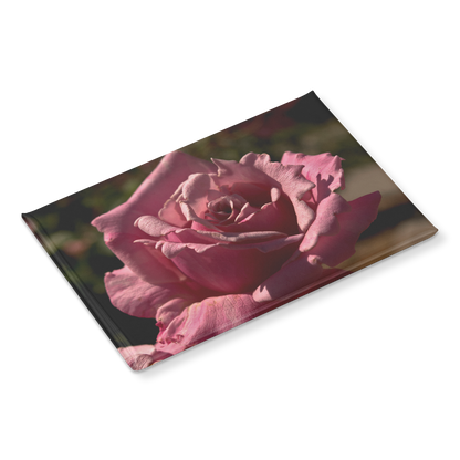 Elegant_Pink_Rose_with_Detailed_Petal_Te_RectangleButtonMagnet_H_Angle_Mockup.png