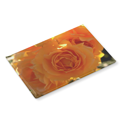 Radiant_Orange_Roses_Bathed_in_Sunlight_RectangleButtonMagnet_H_Angle_Mockup.png