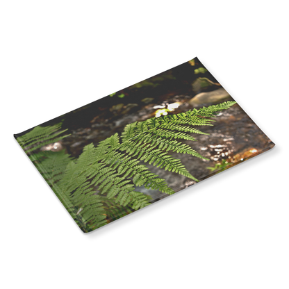 Sunlit_Fern_with_Glimmering_Creek_Backdr_RectangleButtonMagnet_H_Angle_Mockup.png