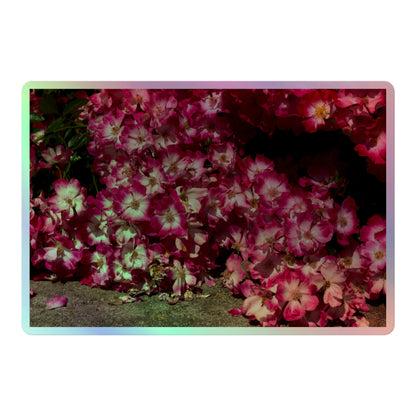 A large rectangular holographic sticker with an image of many pink flowers with white centers.