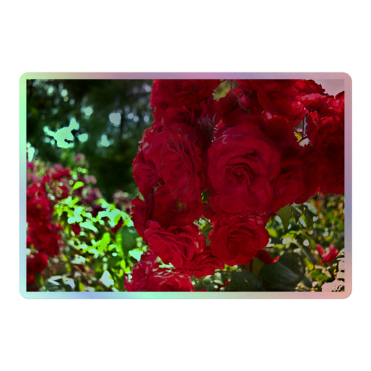 A large rectangular holographic sticker with an image of a cluster of vivid red roses.