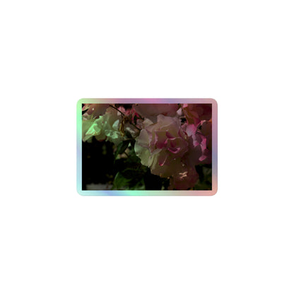A small rectangular holographic sticker with an image of pink tipped white rose blooms.