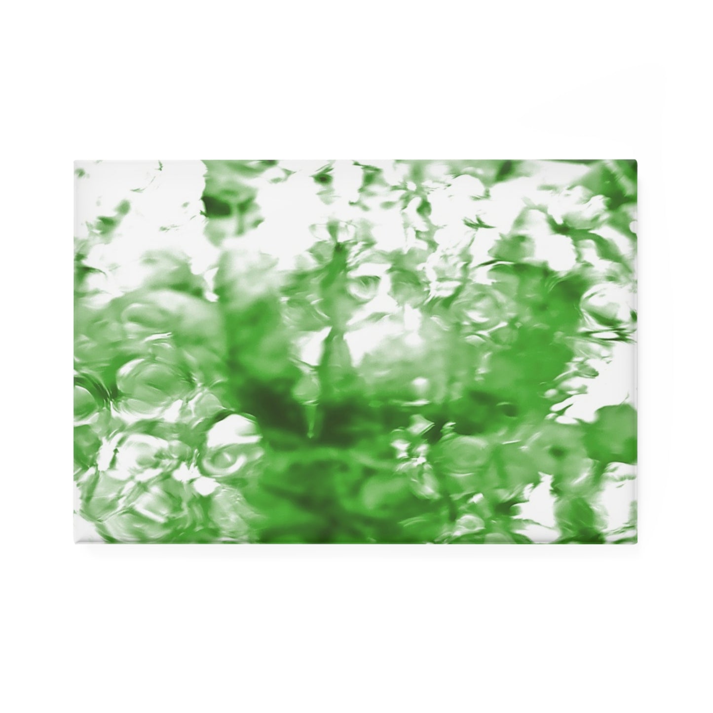 A rectangular button magnet with an image of a vivid green water reflection design.
