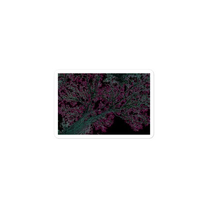 A small rectangular vinyl sticker with an image of a neon pink and turquoise tree design with lightning like features.