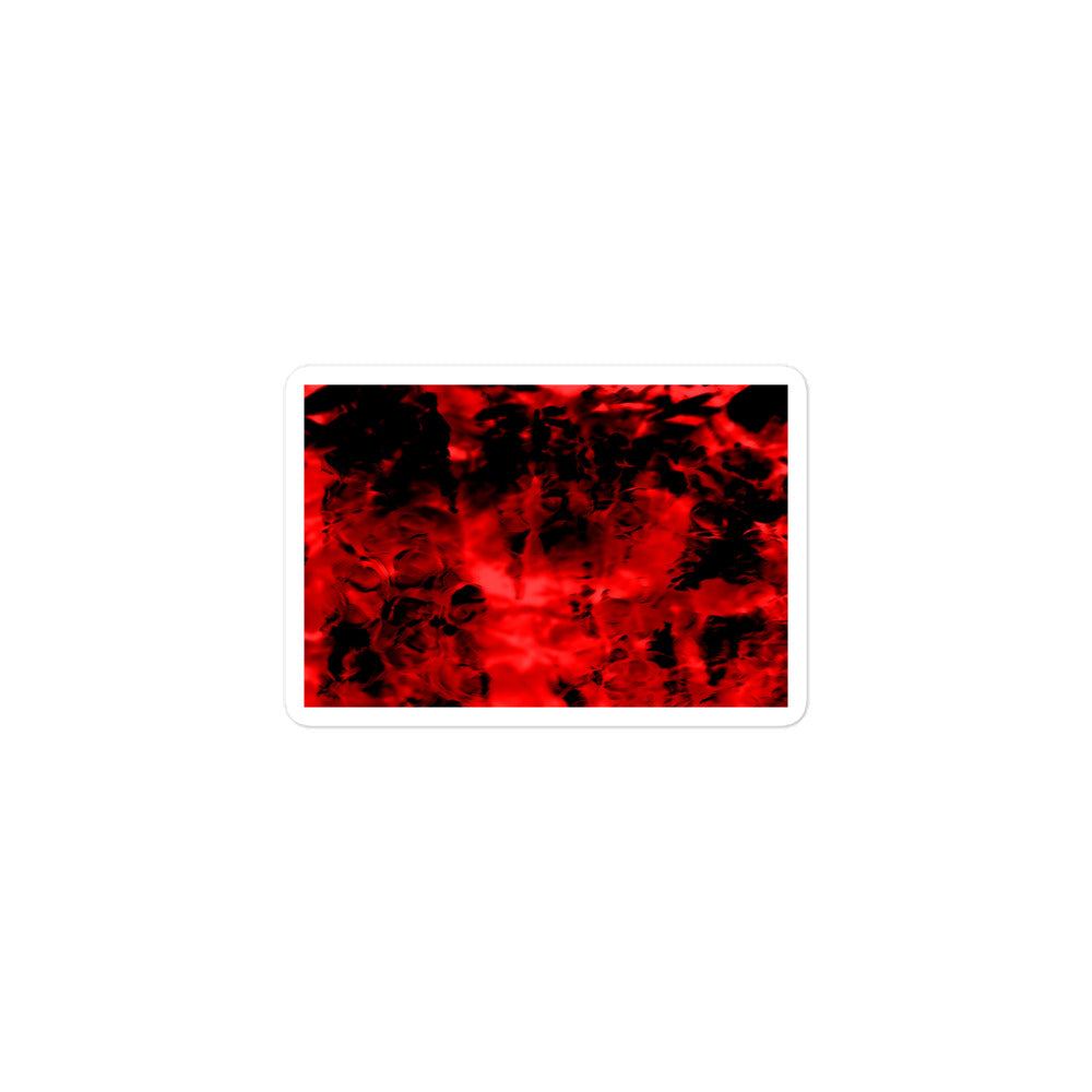 A small rectangular vinyl sticker with an image of a vivid red and black water reflection design.