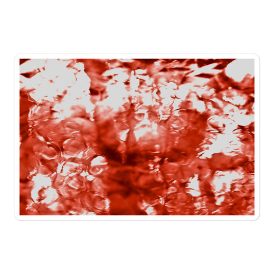 A large rectangular vinyl sticker with an image of a vivid red water reflection design.