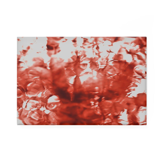 A rectangular button magnet with an image of a vivid red water reflection design.