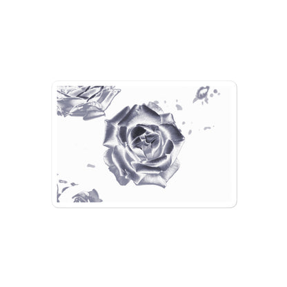A medium rectangular vinyl sticker with an image of a reflective silver rose design.