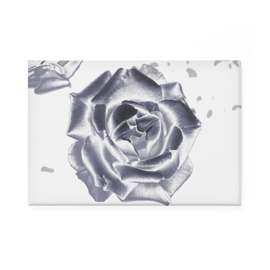 A rectangular button magnet with an image of a silver reflective rose design.